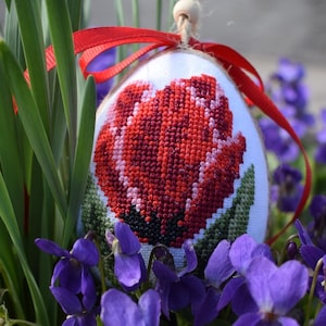 Handmade fabric Easter egg ornament with red tulip embroidery and ribbon bow