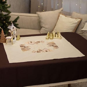 Linen Christmas Table Topper – Embroidered Winter Village Centerpiece with Snowflakes in Beige and Brown Tones