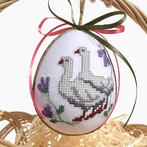 Embroidered Easter egg ornament with white geese and purple flowers – Hanging spring decoration for rustic basket or holiday display