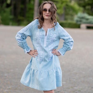 Light blue linen dress with white embroidery