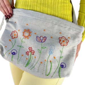 Handmade hemp pouch with floral embroidery
