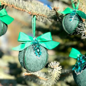 Set of green handmade Christmas tree decorations