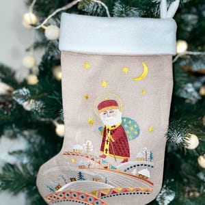 Embroidered Christmas stocking with folk nativity design, Fabric holiday stocking with traditional pattern, Festive home decor