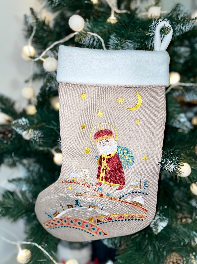 Embroidered Christmas stocking with folk nativity design, Fabric holiday stocking with traditional pattern, Festive home decor