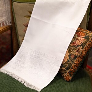 Runner with intricate woven pattern
