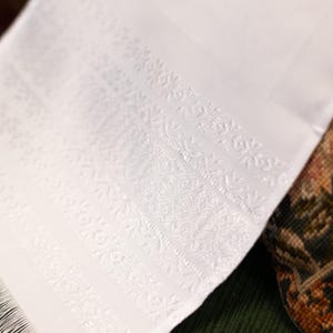 Runner with intricate woven pattern