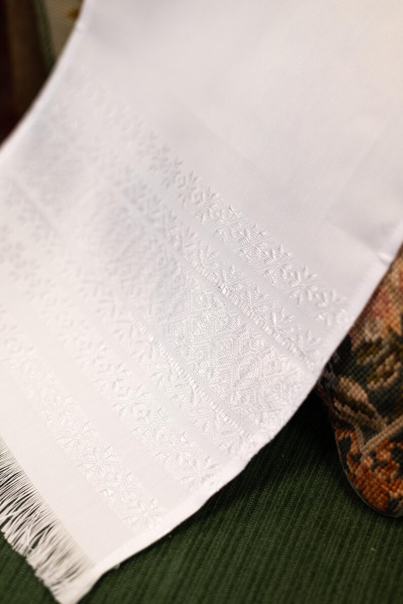 Runner with intricate woven pattern