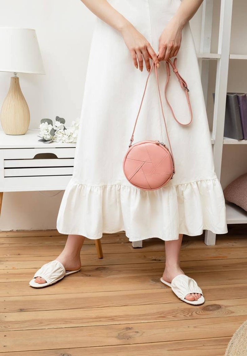 Round Pink Crossbody Bag Minimalist Circle Purse with Adjustable Strap, Modern Small Shoulder Bag for Everyday Wear and Casual Outfits
