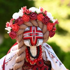 Handmade Ukrainian Motanka doll with embroidered face and traditional wreath, Collectible doll art, Unique decorative gift image 3