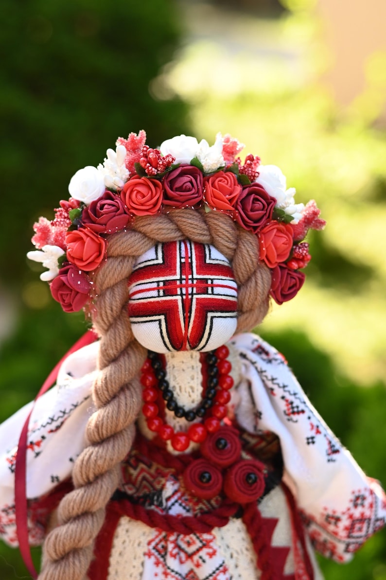 Handmade Ukrainian Motanka doll with embroidered face and traditional wreath, Collectible doll art, Unique decorative gift image 3