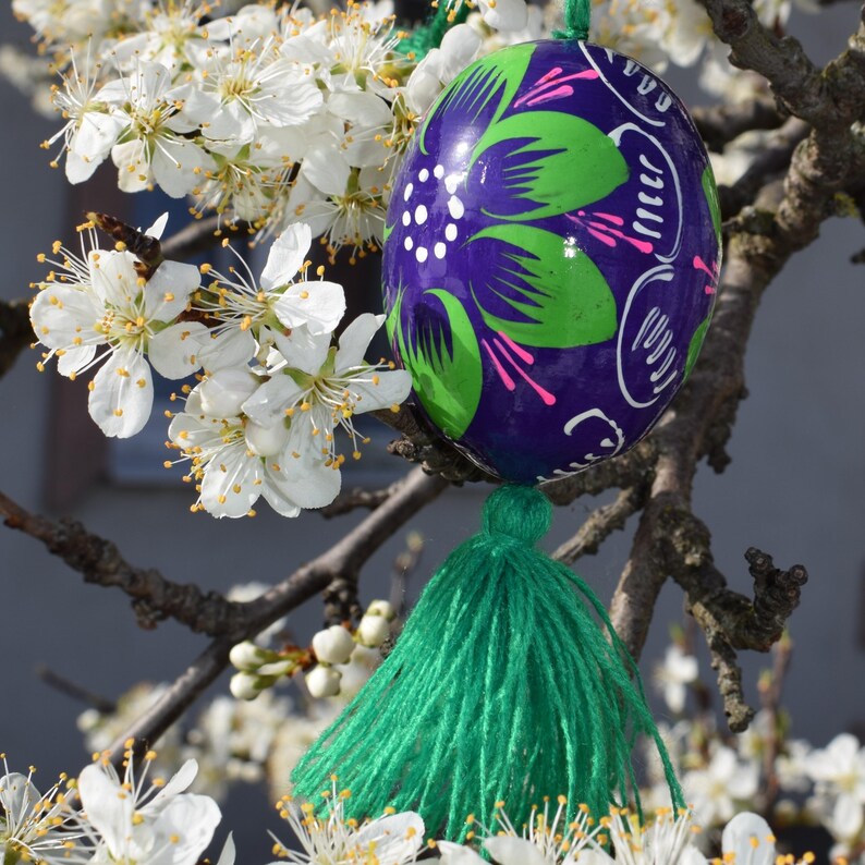 Vibrant wooden Easter egg ornaments with tassels