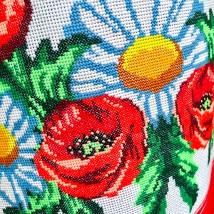 Hand-embroidered table runner with vibrant floral design