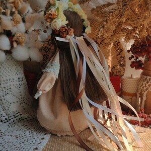 Handmade Ukrainian Motanka doll with floral headpiece