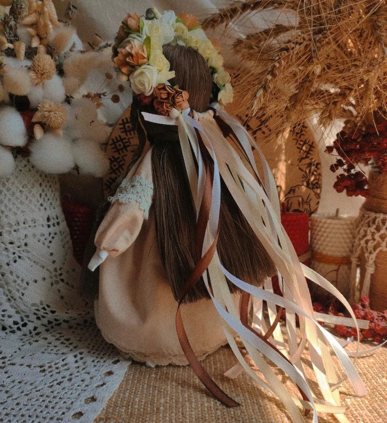 Handmade Ukrainian Motanka doll with floral headpiece