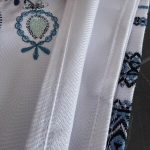 Embroidered towel with folk bird motif, White ukraine hand towel with blue ornament