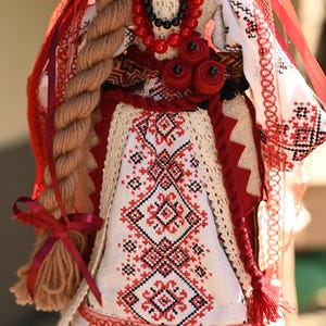Handmade Ukrainian Motanka doll with embroidered face and traditional wreath, Collectible doll art, Unique decorative gift image 7