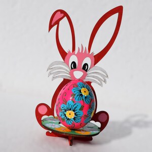 Hand painted wooden Easter egg with bright folk art floral pattern