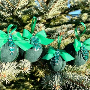 Set of green handmade Christmas tree decorations