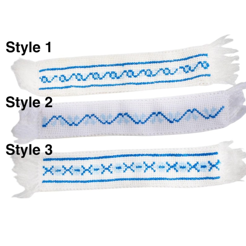 Embroidered fabric bookmark with blue cross stitch