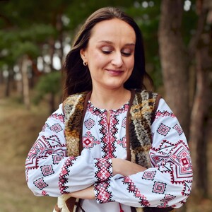 White Folk Embroidered Blouse with Red and Black Geometric Patterns – Long Sleeve Traditional Peasant Shirt for Women with Tassel Tie Detail