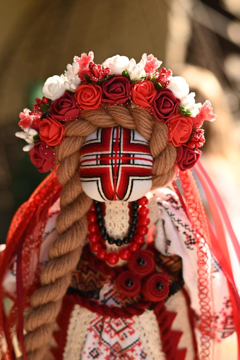 Handmade Ukrainian Motanka doll with embroidered face and traditional wreath, Collectible doll art, Unique decorative gift image 9