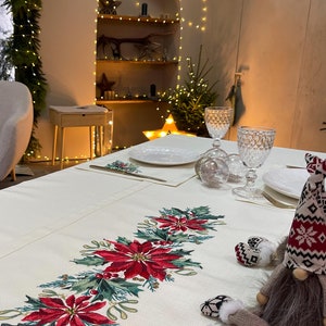 Beige Christmas centrepiece with Embroidered Holiday Wreath and Poinsettias, Elegant Festive Dining Set with Napkins, Winter Pinecone Decor.