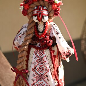 Handmade Ukrainian Motanka doll with embroidered face and traditional wreath, Collectible doll art, Unique decorative gift image 6