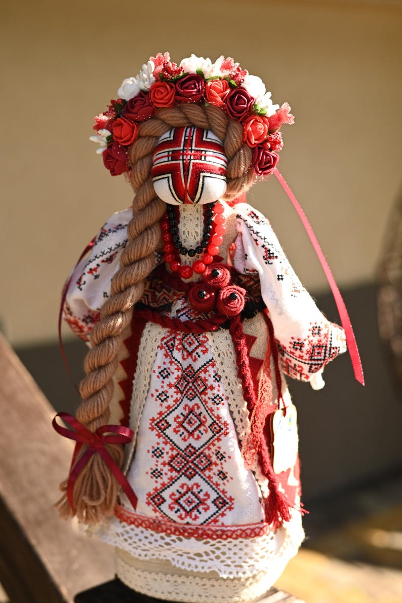 Handmade Ukrainian Motanka doll with embroidered face and traditional wreath, Collectible doll art, Unique decorative gift image 6