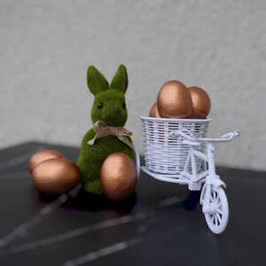 Elegant wooden decorative eggs in gift box for spring holiday table or Christian decor