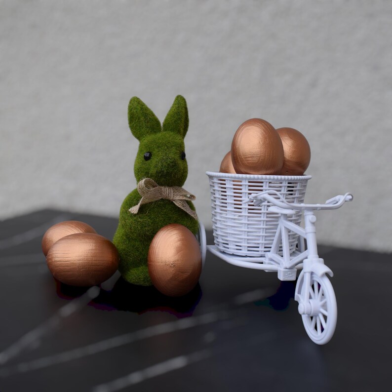 Elegant wooden decorative eggs in gift box for spring holiday table or Christian decor
