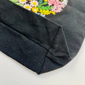 Handmade black tote bag with floral embroidery