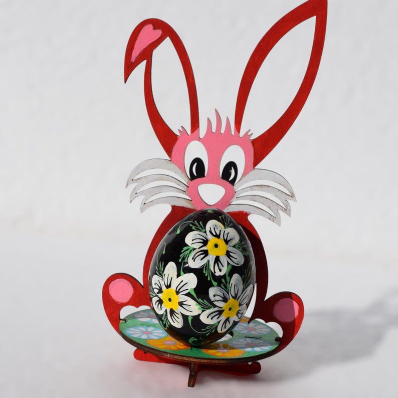 Hand painted wooden Easter egg with bright folk art floral pattern