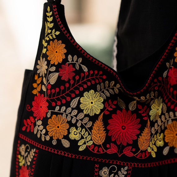Boho embroidered shoulder bag — Black fabric tote with floral patterns — Ethnic cross-body bag with metal rings for women