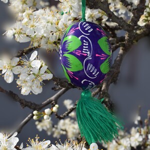Vibrant wooden Easter egg ornaments with tassels