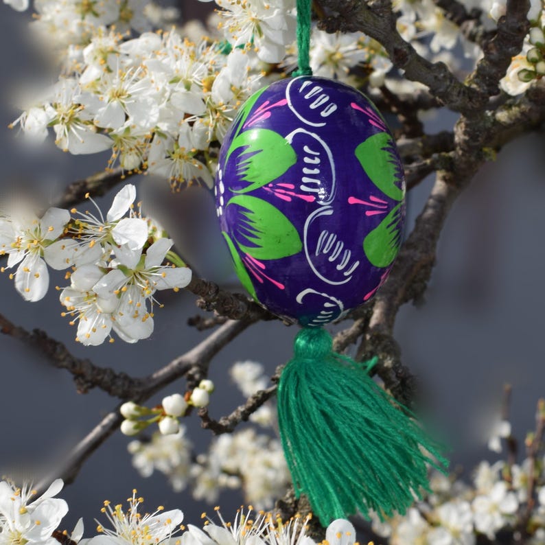 Vibrant wooden Easter egg ornaments with tassels