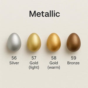 May include: Four metallic-effect egg-shaped objects in silver, light gold, warm gold, and bronze. Each egg has a number and colour description: 56 Silver, 57 Gold (light), 58 Gold (warm), and 59 Bronze. The word "Metallic" is at the top.