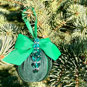 Set of green handmade Christmas tree decorations