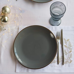 Embroidered white placemats set