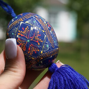 Hand-painted Ukrainian pysanka Easter egg ornaments with tassels