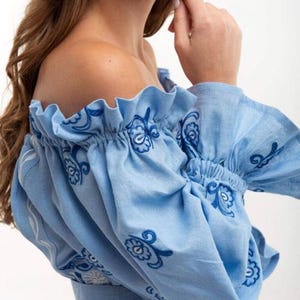 Light blue embroidered linen dress