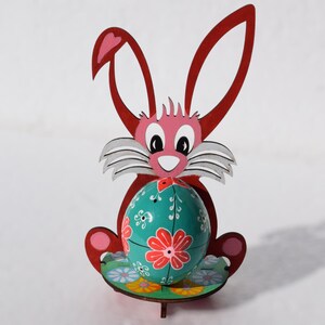 Hand painted wooden Easter egg with bright folk art floral pattern