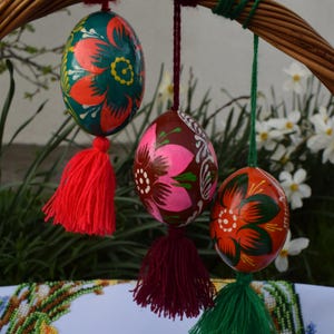 Vibrant wooden Easter egg ornaments with tassels