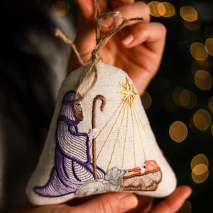 Linen nativity shepherd Christmas ornament, Embroidered baby Jesus manger decor with star, rustic Christian tree hanging decoration