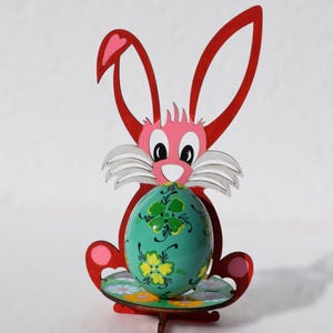Hand painted wooden Easter egg with bright folk art floral pattern