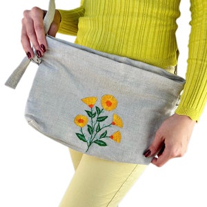 Handmade hemp pouch with floral embroidery