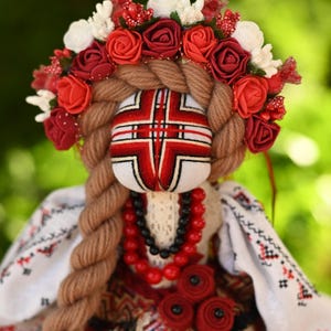 Handmade Ukrainian Motanka doll with embroidered face and traditional wreath, Collectible doll art, Unique decorative gift image 1