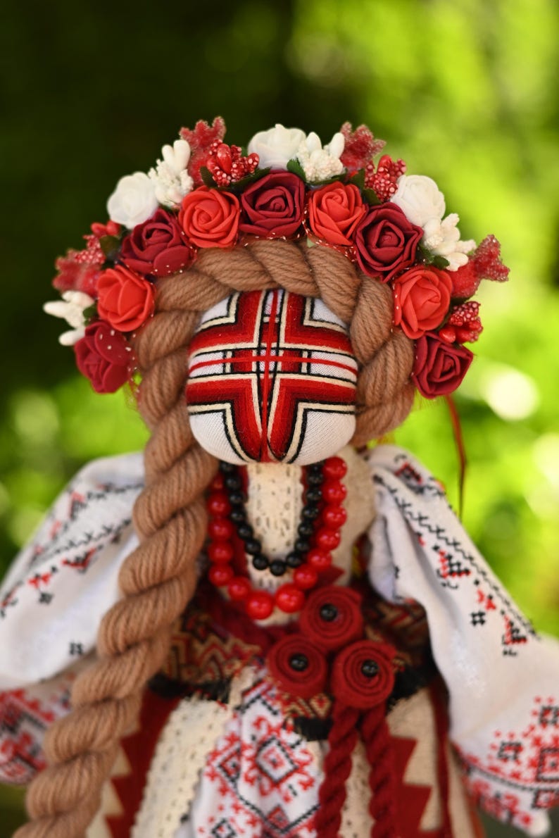 Handmade Ukrainian Motanka doll with embroidered face and traditional wreath, Collectible doll art, Unique decorative gift image 1
