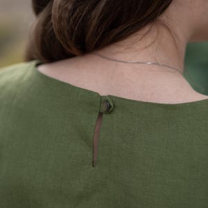 Green linen sleeveless top with embroidery