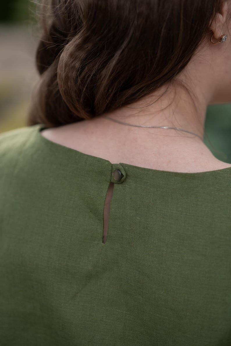 Green linen sleeveless top with embroidery