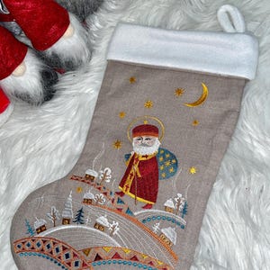 Embroidered Christmas stocking with folk nativity design, Fabric holiday stocking with traditional pattern, Festive home decor
